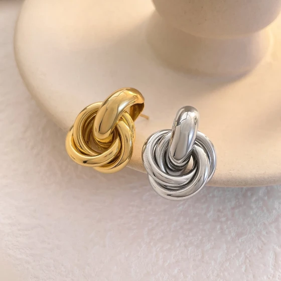 European and American style silver circular geometric twisted multi-layered twisted earrings, niche design, fashionable and versatile ear accessories