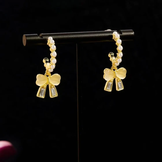 Cat's Eye Stone Bowknot Pearl Earrings for Women, Light Luxury Niche Design, Fashionable and Versatile Earrings