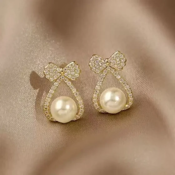 Simple and new Korean style small bow pearl trendy high-end elegant internet celebrity fashion versatile earrings for women