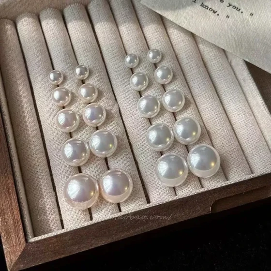 New autumn and winter flat round simple pearl earrings, light luxury niche versatile chic exquisite women's earrings