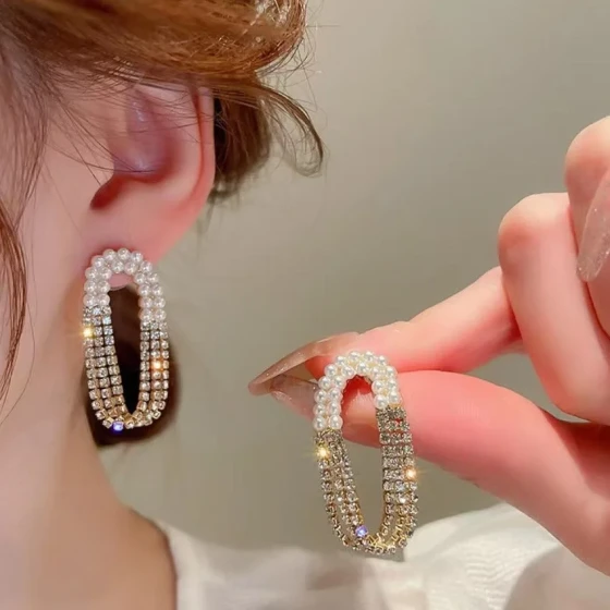 Korean diamond-studded pearl oval tassel earrings, niche light luxury, versatile and stylish design, stud earrings