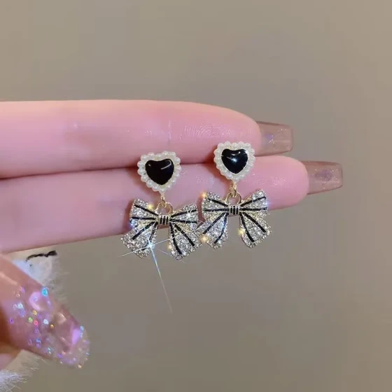 Heart-shaped pearl bow earrings, high-end earrings, new trendy style, niche design earrings