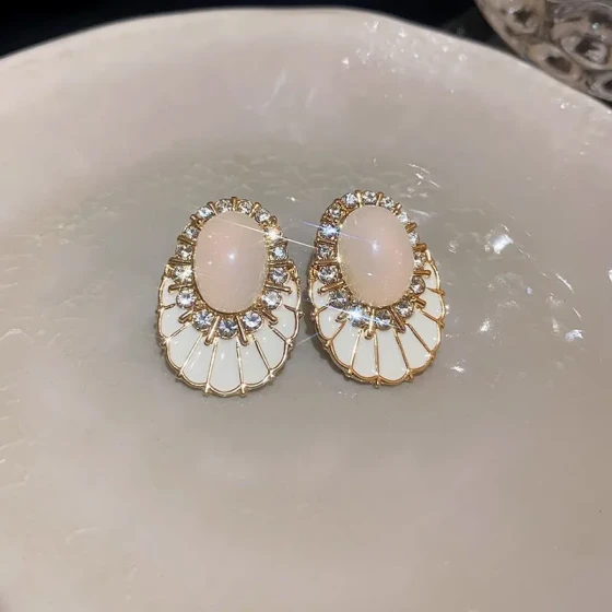 Silver needle earrings with diamond-encrusted skirt and oil-drip design, French retro light luxury style, unique and simple elegant earrings
