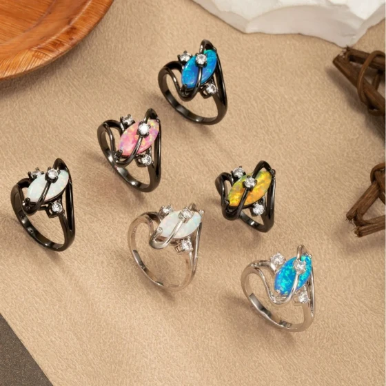 New Fashionable Luxury S Diamond-encrusted black gold marquise opal ring with a unique and elegant style