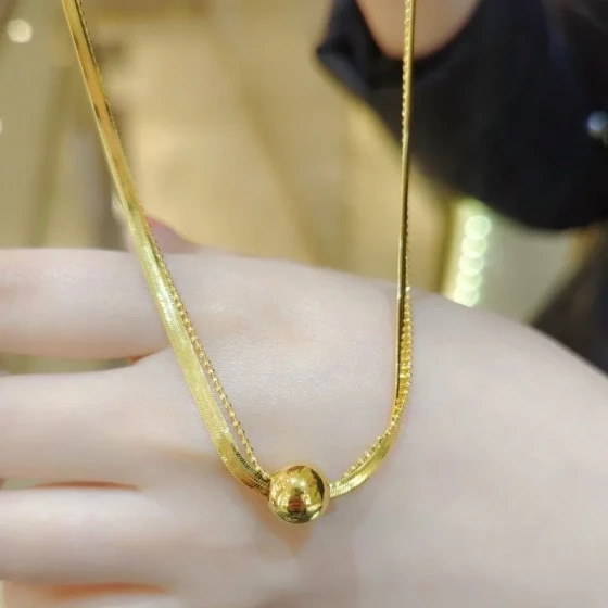 Double-layer gold bead necklace for women, minimalist and niche design, light luxury with a high-end feel, suitable for sweater wear