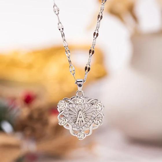 New European and American fashion light luxury hollow floral letter necklace pendant for men and women, exquisite and elegant accessory