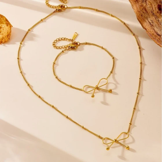 Women's Titanium Steel Non-Fading Bow gold New High-End Jewelry Set, Including Bracelet and Necklace