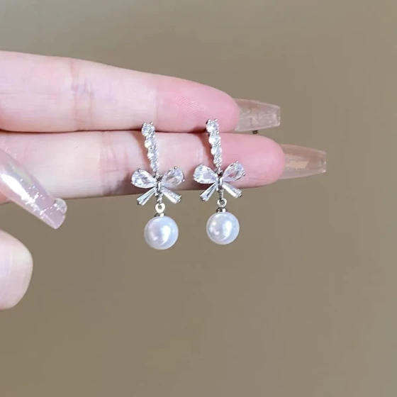 s925Zircon bow earrings, ultra-shiny earrings for women, light luxury, high-end, niche, sweet and versatile stud earrings