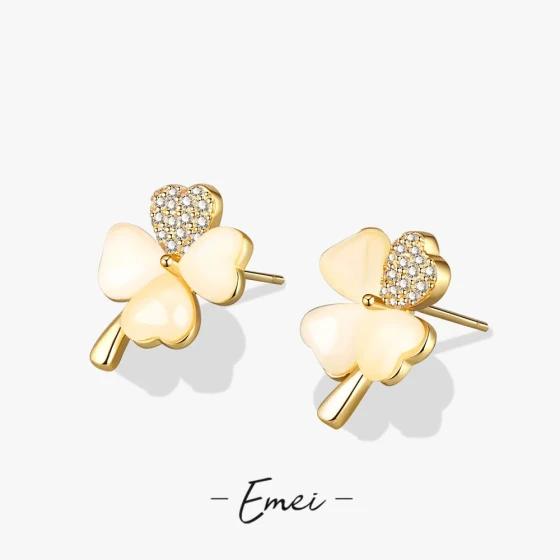 Korean fashion lucky four-leaf clover cat's eye stone earrings, small and versatile earrings for round-faced girls, slimming earrings