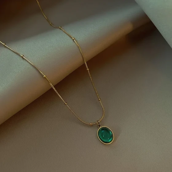 Titanium steel small round bead oval cat's eye stone necklace Vintage artistic style light luxury collarbone necklace New jewelry