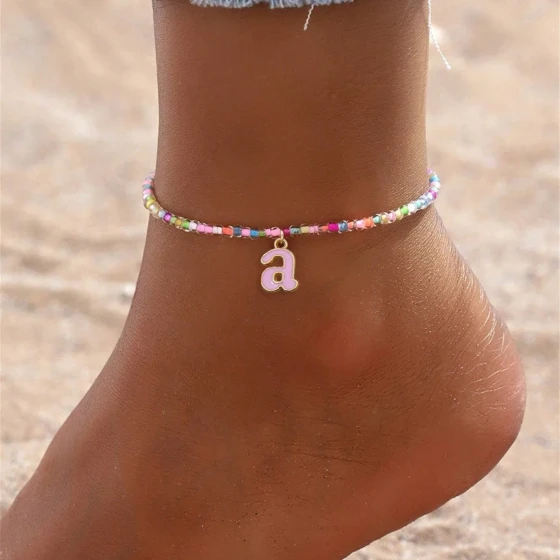 European and American pink oil-drip creative letter glass bead anklet for women, personalized, fashionable, versatile, and elegant foot accessory