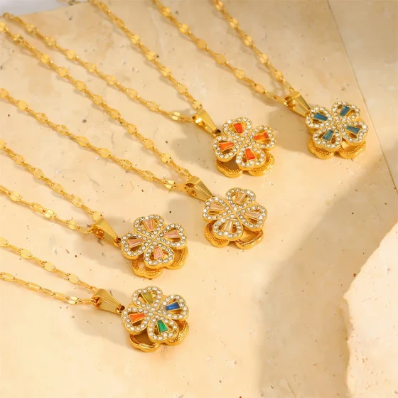 Titanium steel necklace for women with diamonds, four-leaf rotatable flower design, light luxury, high-end fashion, versatile and elegant collarbone chain accessory