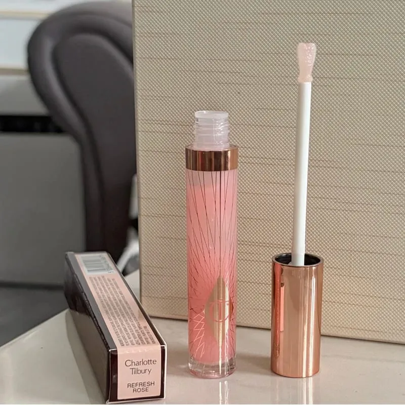 Charlotte Tilbury CT Makeup Set Water Light Collagen Lip Moisturizer Pressed Powder for Flawless Finish Four-color Eyeshadow — image 17