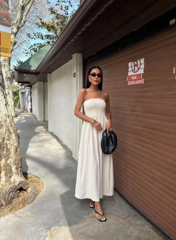 2026 Nieuwe zomermode effen kleur off-shoulder strapless taille-cinching lange jurk voor dames