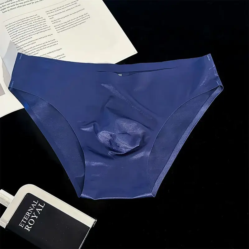 Slip da uomo in seta di ghiaccio Mutandine sexy senza cuciture ultrasottili Asciugatura rapida U Custodia rigonfia Biancheria intima traspirante Mutande lucide di lusso