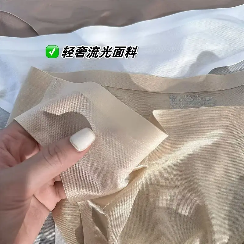 Slip da uomo in seta di ghiaccio Mutandine sexy senza cuciture ultrasottili Asciugatura rapida U Custodia rigonfia Biancheria intima traspirante Mutande lucide di lusso
