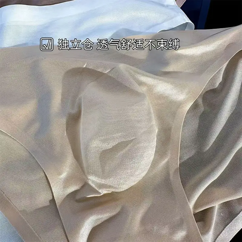 Slip da uomo in seta di ghiaccio Mutandine sexy senza cuciture ultrasottili Asciugatura rapida U Custodia rigonfia Biancheria intima traspirante Mutande lucide di lusso