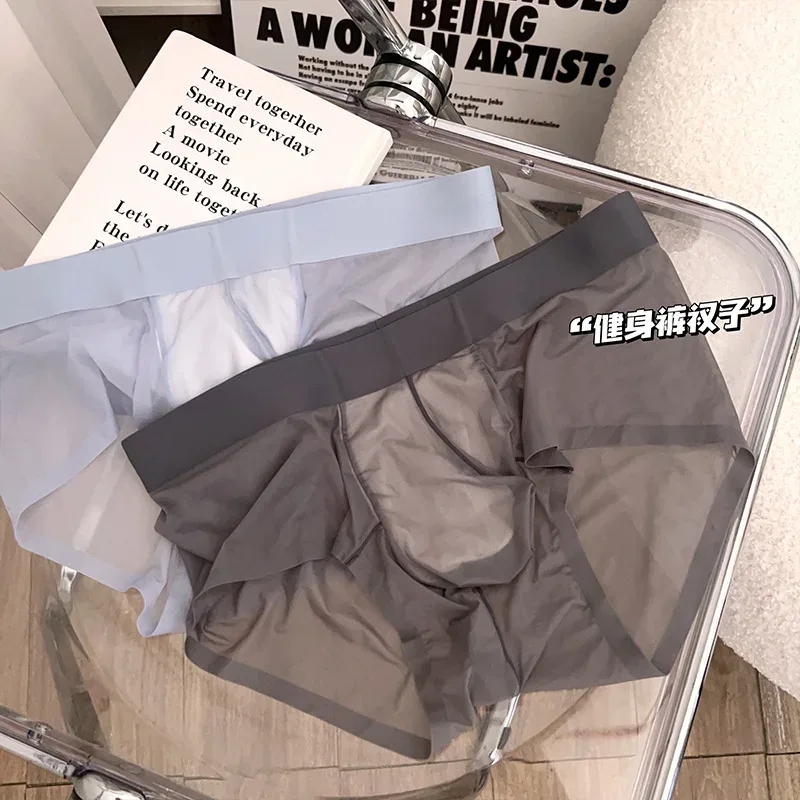 투명 남자 팬티 초박형 얼음 실크 빠른 건조 팬티 섹시한 U 벌지 주머니 남자 속옷 통기성 속옷 Cuecas