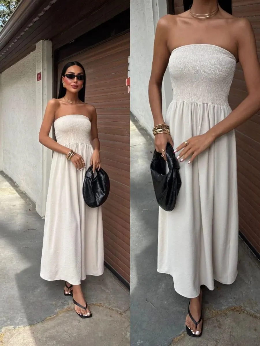 2026 Nieuwe zomermode effen kleur off-shoulder strapless taille-cinching lange jurk voor dames