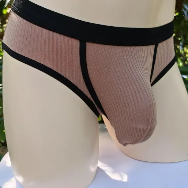 Herenslips met grote zakken zijn erg sexy. Sportondergoed met grote ruimte voor heren 3256810183240378