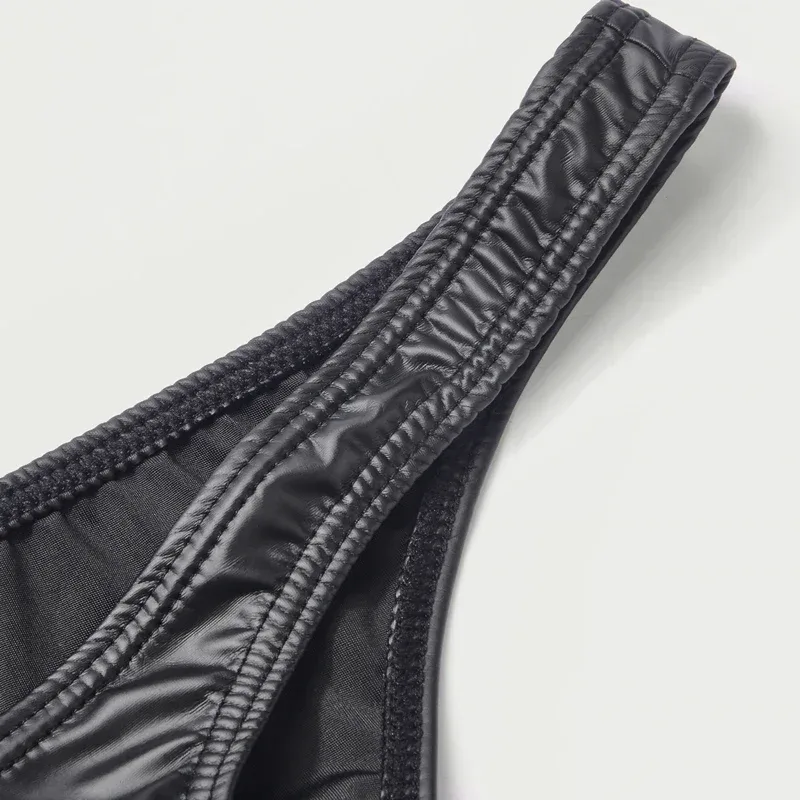 Slip bikini in ecopelle da uomo mutande U Pouch Slip sexy per uomo Lingerie di alta qualità Cuecas Calzoncillos Mutandine maschili