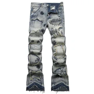 Pantalons texans de tall de botes d'home Pedaços de roba de carrer Pantalons acampanats amb brodat blau vintage Pantalons acampanats