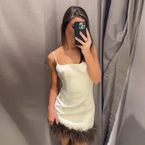 Mode 2026 élégant français épissage plume Mini robe femmes sans manches dos nu fête fronde robes robes de soirée